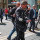 Brexit Party leader Nigel Farage has what is reported to be a milkshake thrown on him as he visits Northumberland Street in Newcastle Upon Tyne, England, on May 20.